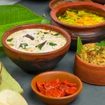 kerala-traditional-feast-side-dishes-arranged-greycolour-background_527904-2220-_1_ (1)