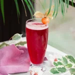 red-drink-with-foam-flower-berry_114579-3219